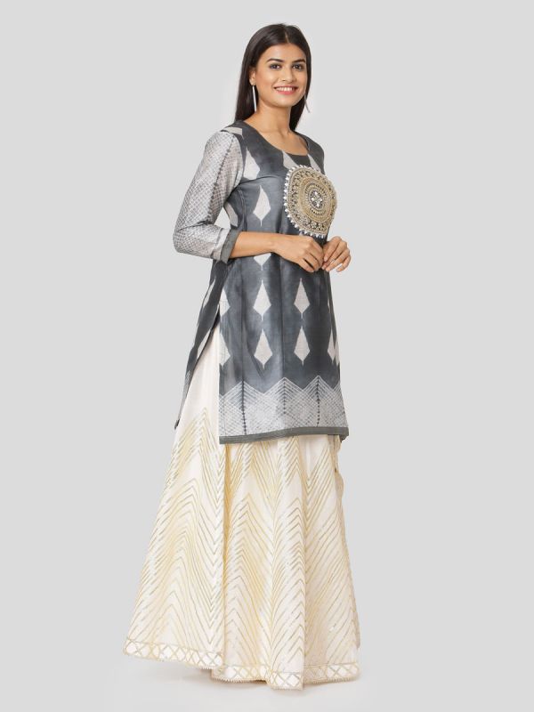 Conflict Grey Chanderi Tie & Dye Jacket Top With Hand Embroidery Work & Printed Ivory Skirt With Tassels